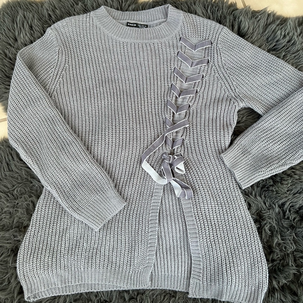 Grey sweater with ribbon lacing detail